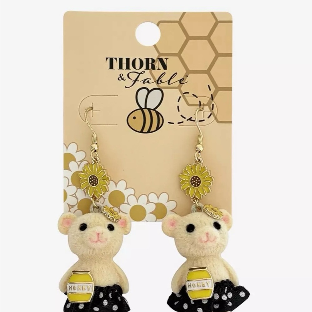 Cream and Black Thorn Earrings with Whimsical Design